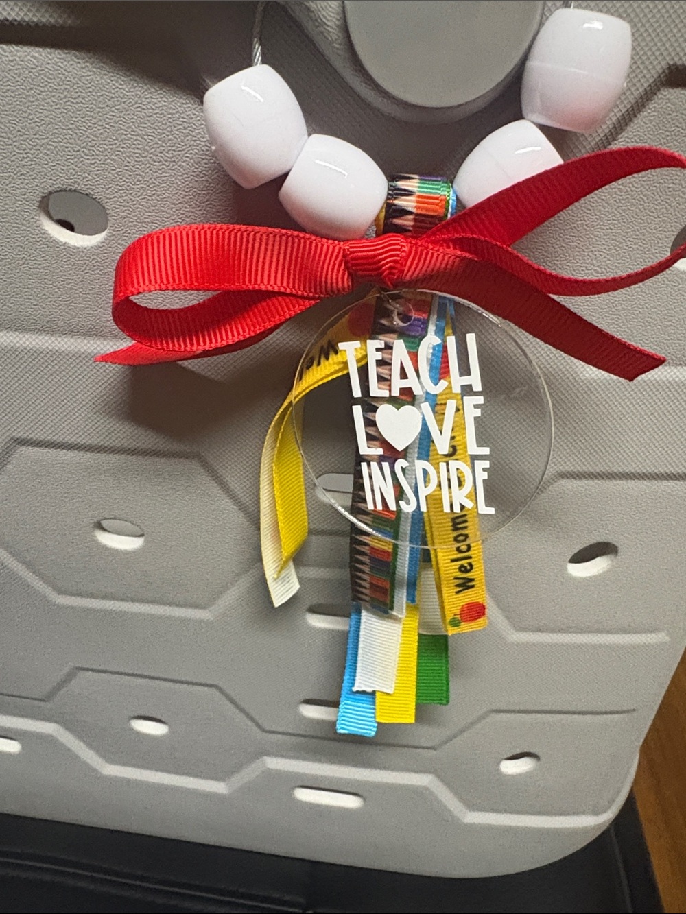 Teach Love Inspire Acrylic Charm with Red Bow and Colorful Ribbons